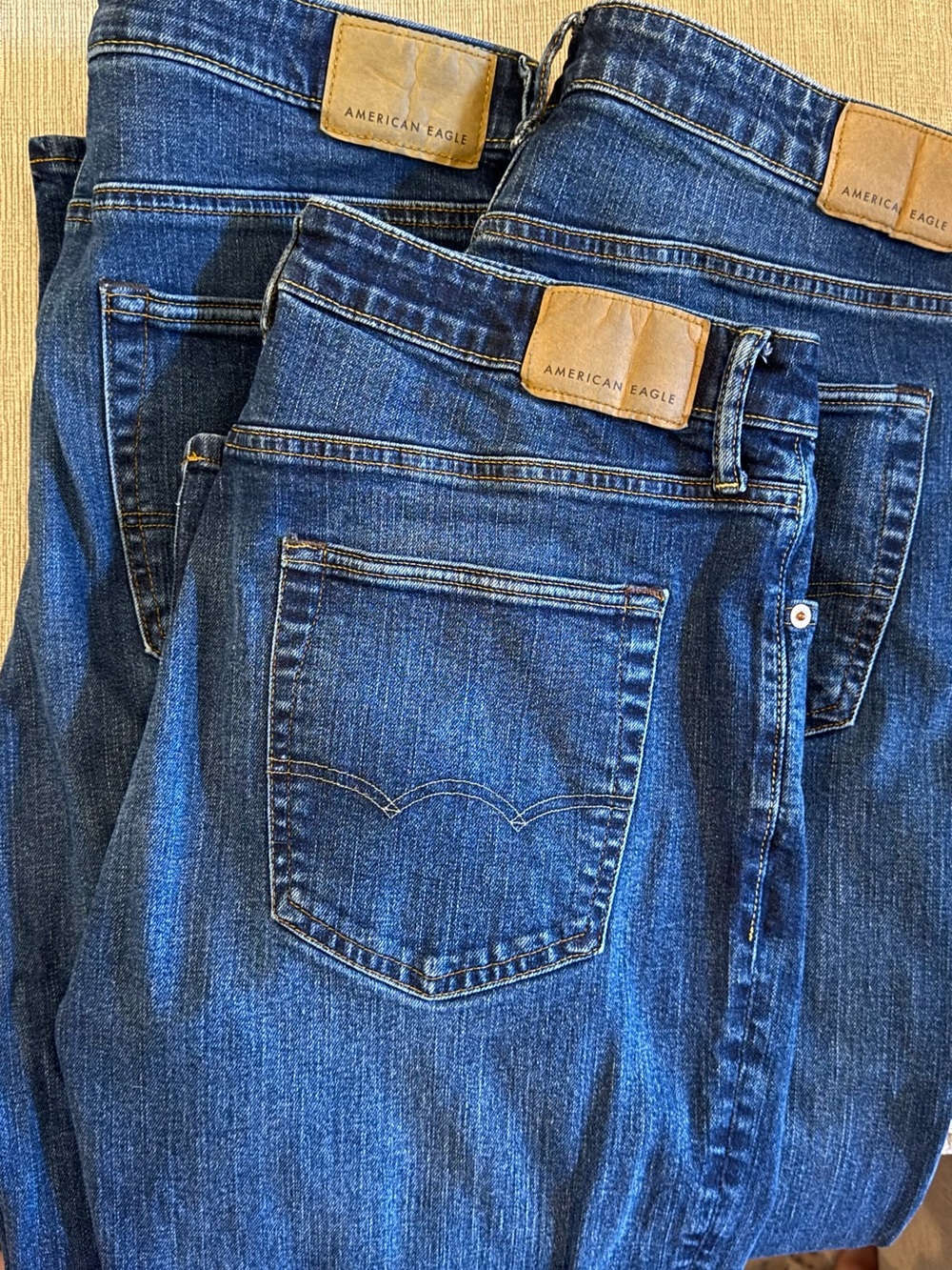 3 Pairs of American Eagle Dark Blue Denim Relaxed Boot Cut. Like new!